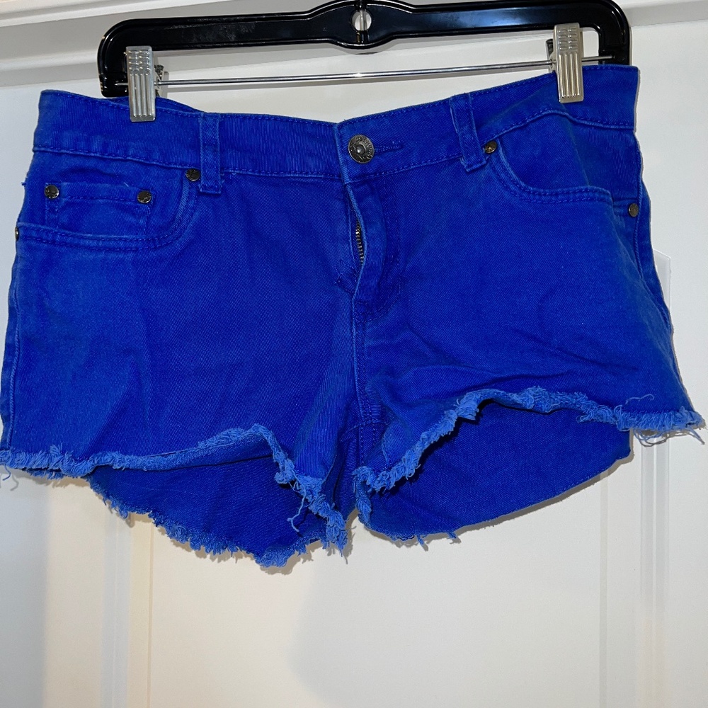 Bright blue distressed jean short